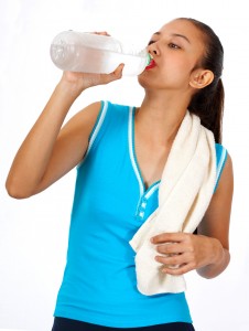 Sporty Girl Quenching Her Thirst